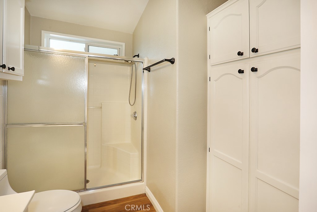 61 Saddleback Road Tustin, CA 92780 - Photo 23 of 49 a bathroom with a shower and a toilet