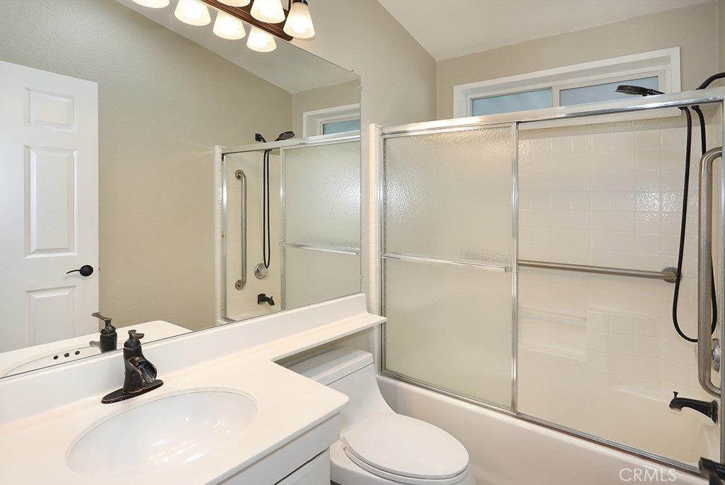 61 Saddleback Road Tustin, CA 92780 - Photo 31 of 49 a bathroom with a sink toilet and shower