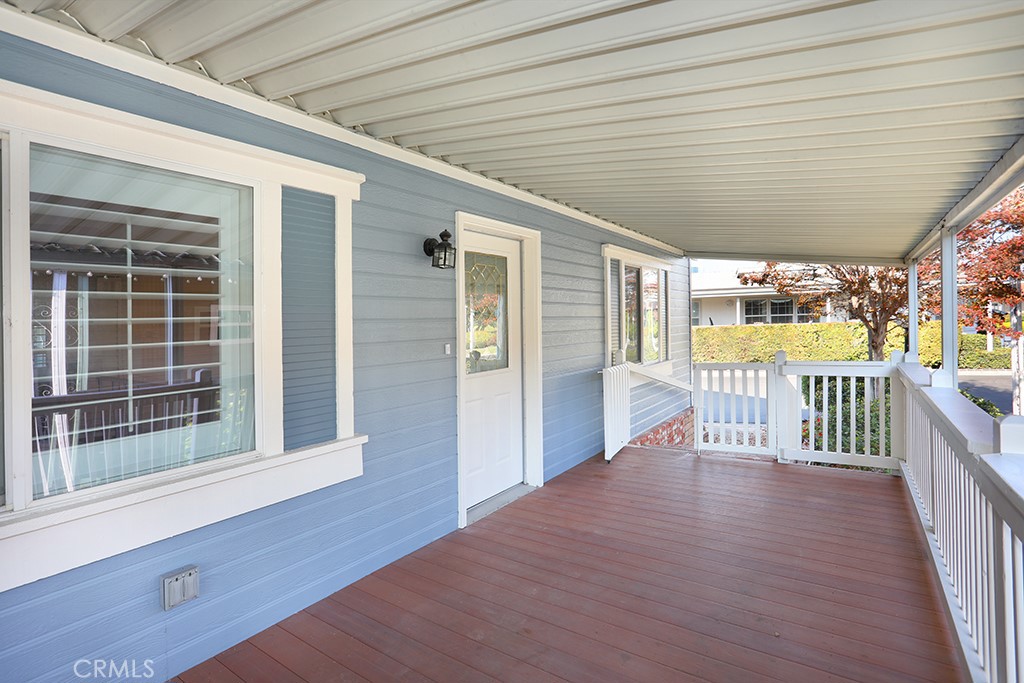 61 Saddleback Road Tustin, CA 92780 - Photo 35 of 49 a view of a porch with wooden floor
