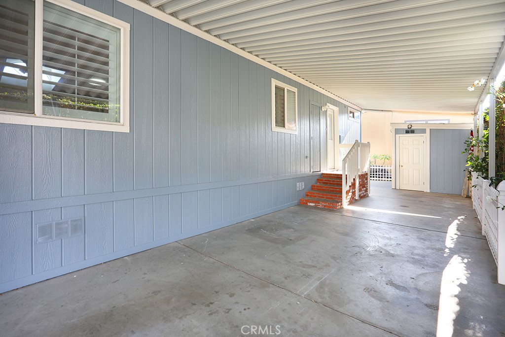 61 Saddleback Road Tustin, CA 92780 - Photo 41 of 49 a view of a livingroom with an empty space and staircase