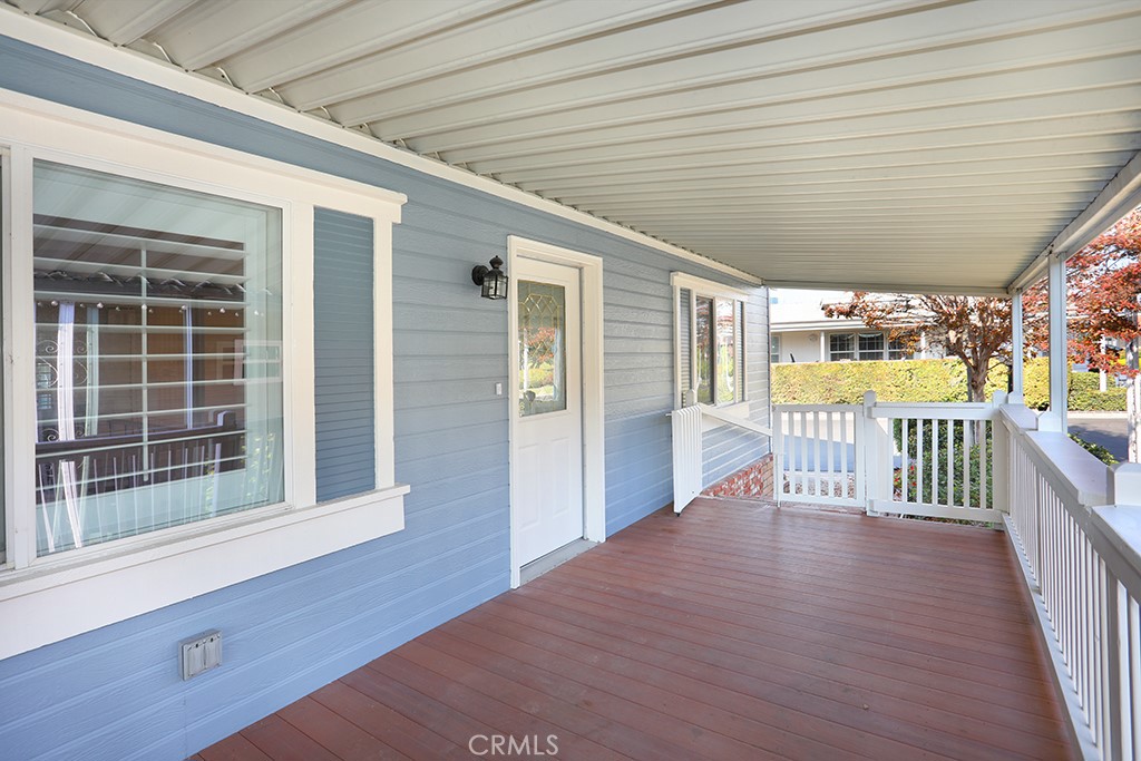 61 Saddleback Road Tustin, CA 92780 - Photo 43 of 49 a view of a porch with wooden floor