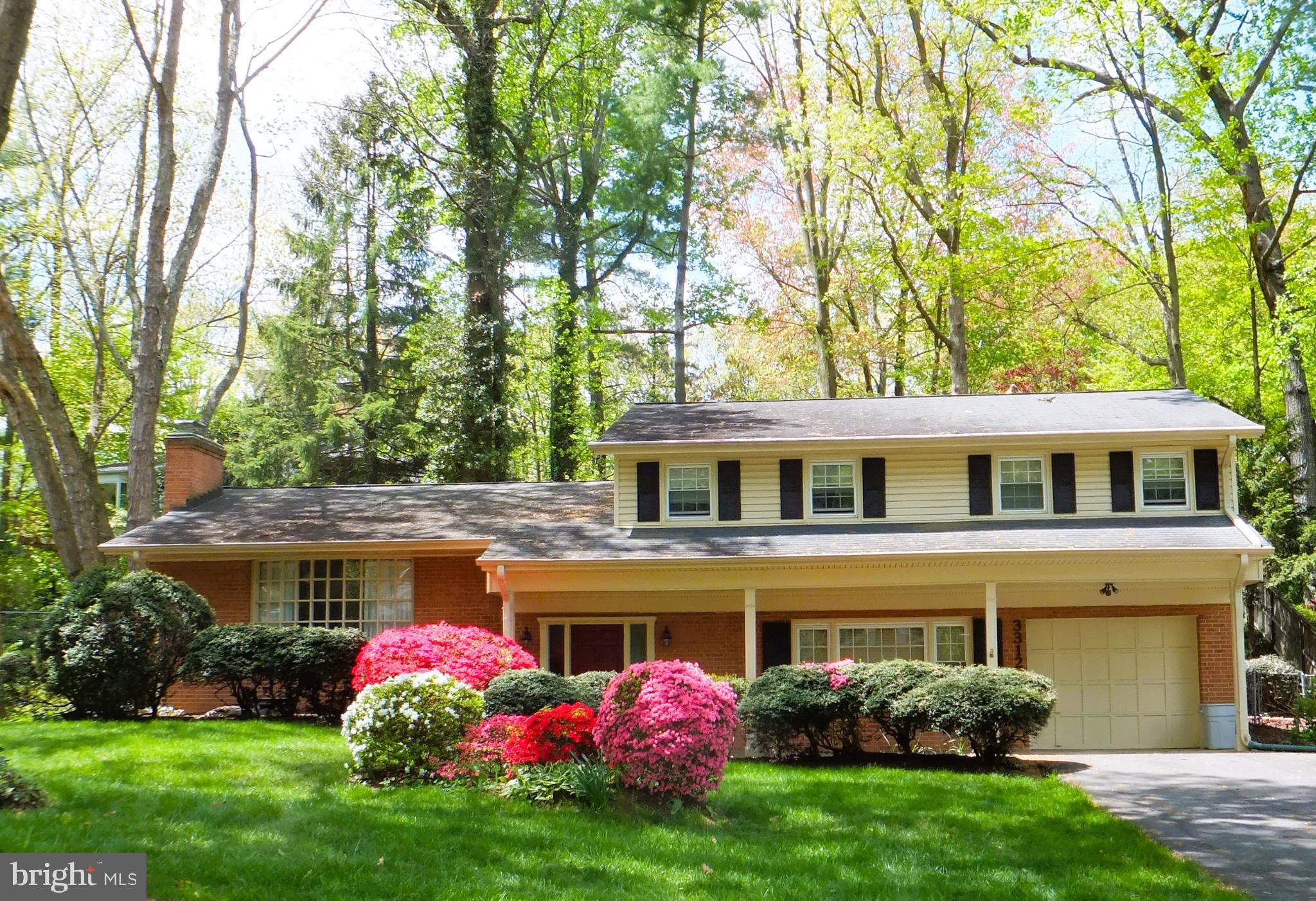 3312 Midland Road Fairfax, VA 22031 - Photo 1 of 12 Charming home nestled among vibrant greenery.