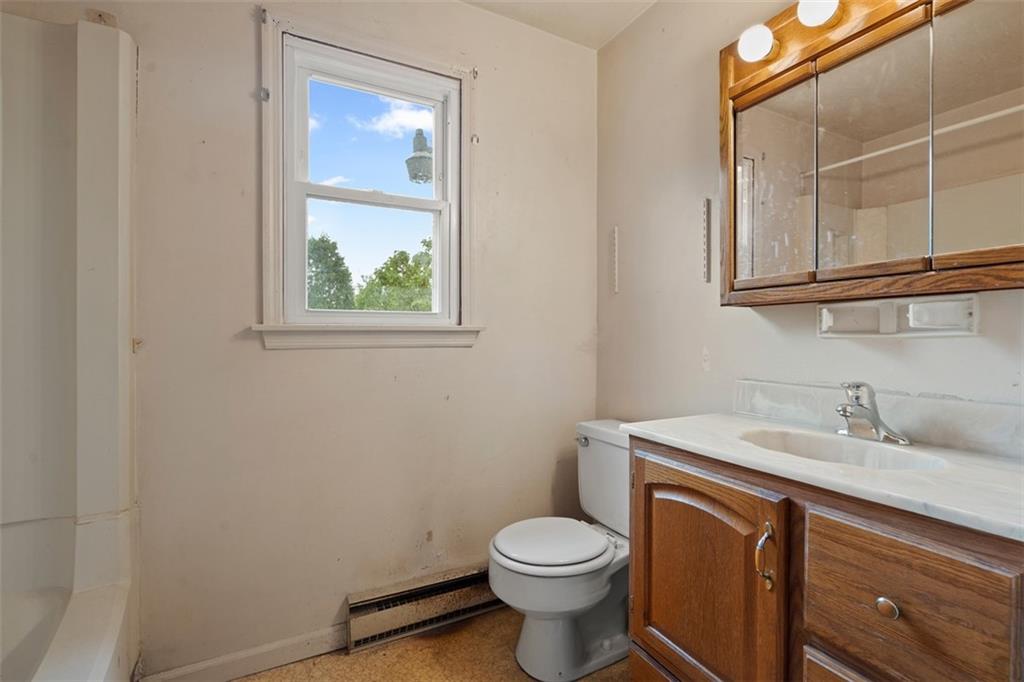 724 Camp Meeting Road Sewickley, PA 15143 - Photo 22 of 32 a bathroom with a sink a toilet and shower