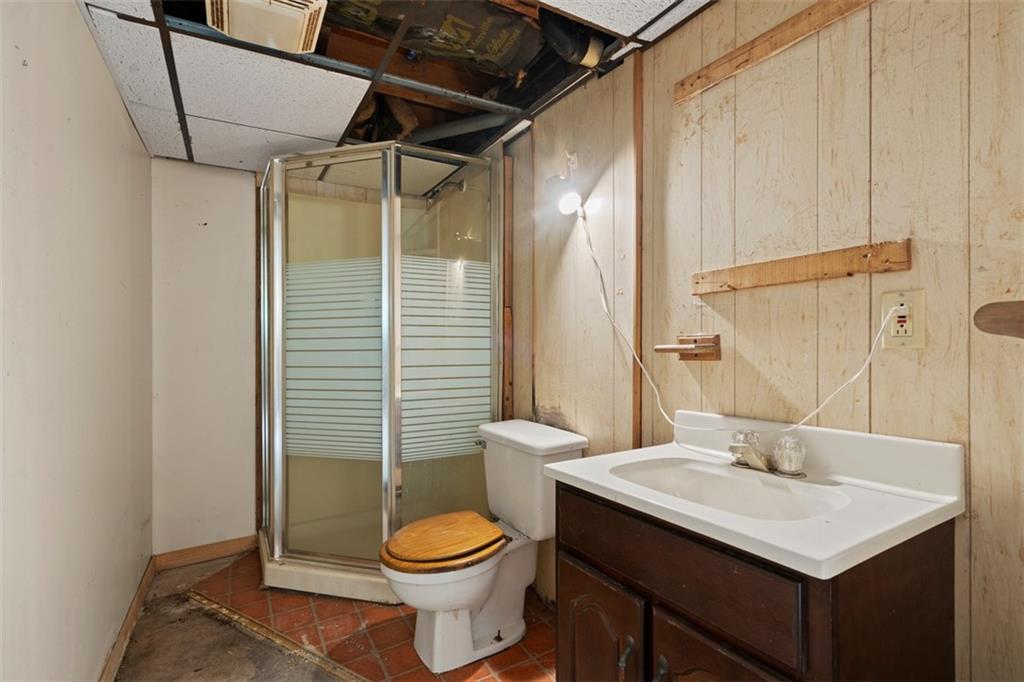 724 Camp Meeting Road Sewickley, PA 15143 - Photo 29 of 32 a bathroom with a sink a toilet and shower