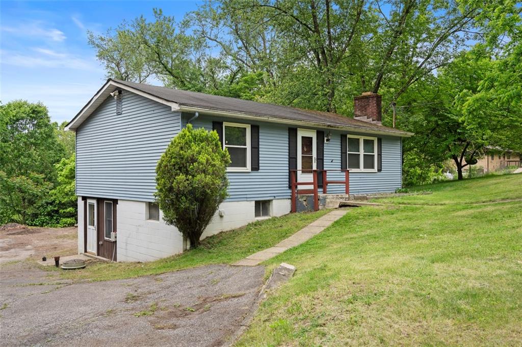 724 Camp Meeting Road Sewickley, PA 15143 - Photo 3 of 32 a front view of house with yard and green space
