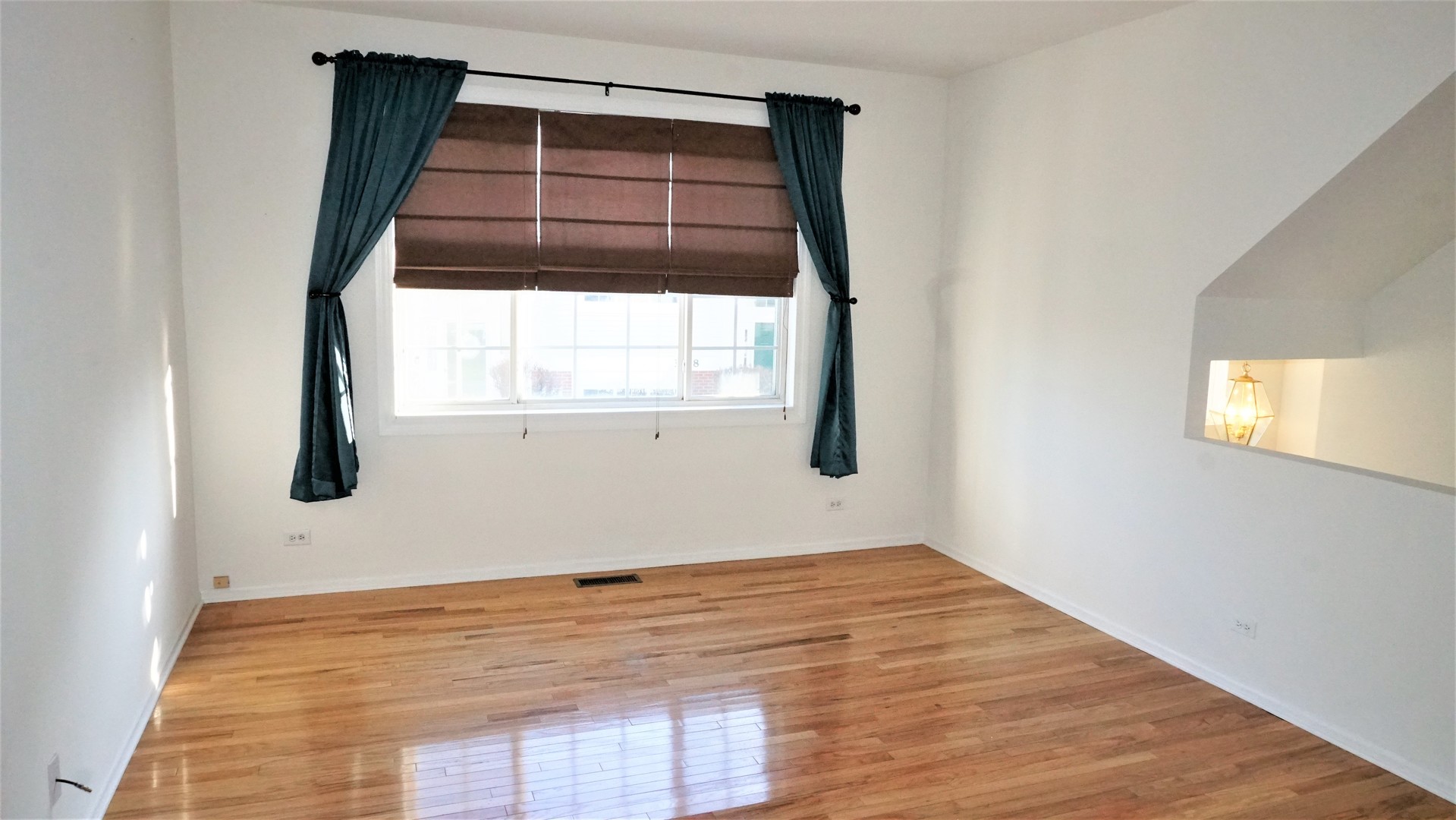 3360 Ravinia Circle Aurora, IL 60504 - Photo 3 of 32 an empty room with a window