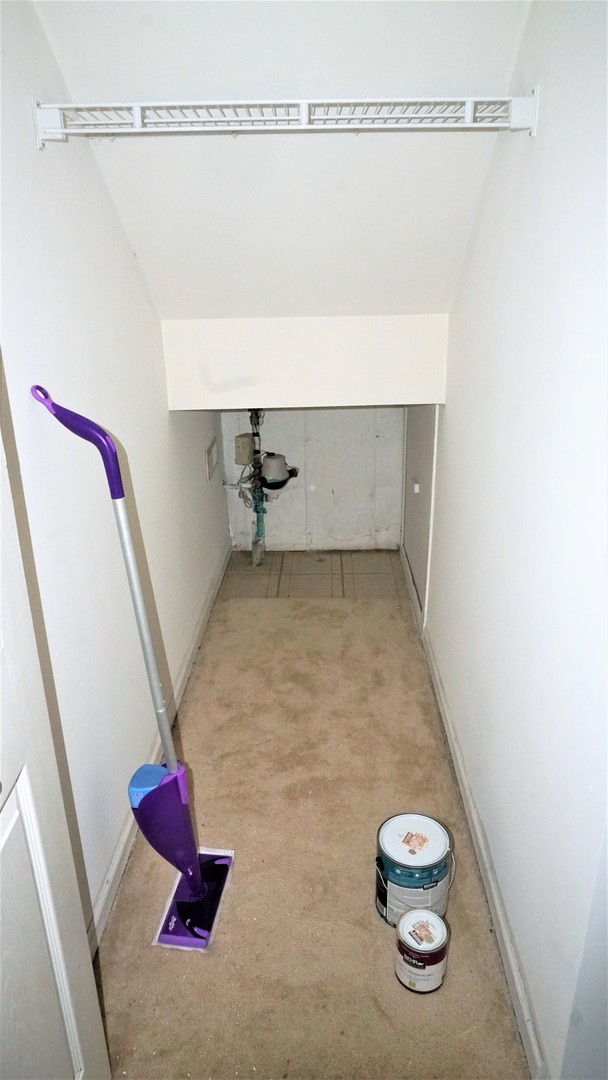 3360 Ravinia Circle Aurora, IL 60504 - Photo 28 of 32 a bathroom with a sink and a mirror