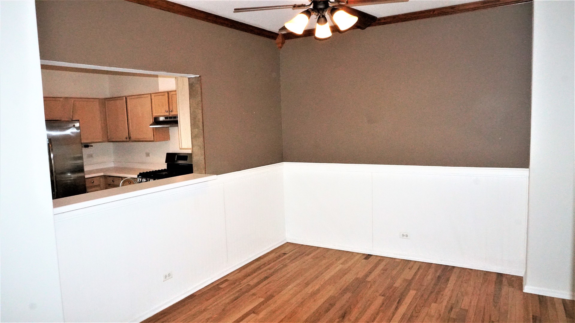 3360 Ravinia Circle Aurora, IL 60504 - Photo 9 of 32 a living room with a wooden floor