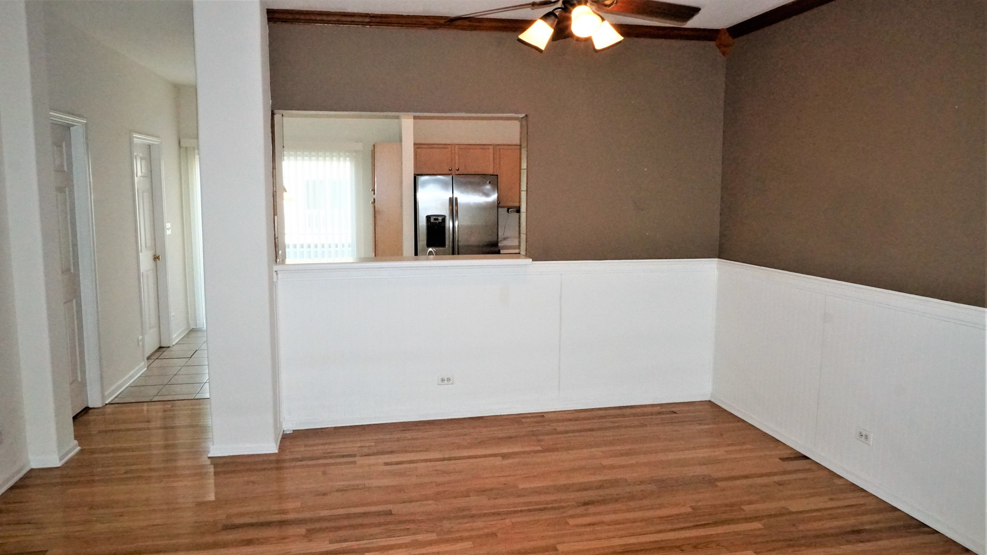 3360 Ravinia Circle Aurora, IL 60504 - Photo 10 of 32 wooden floor in an empty room