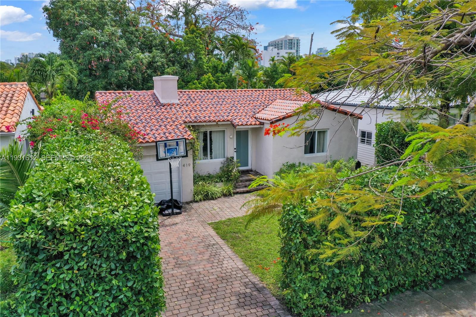 419 Southwest 30th Road Miami, FL 33129 - Photo 22 of 22 a front view of a house with a yard