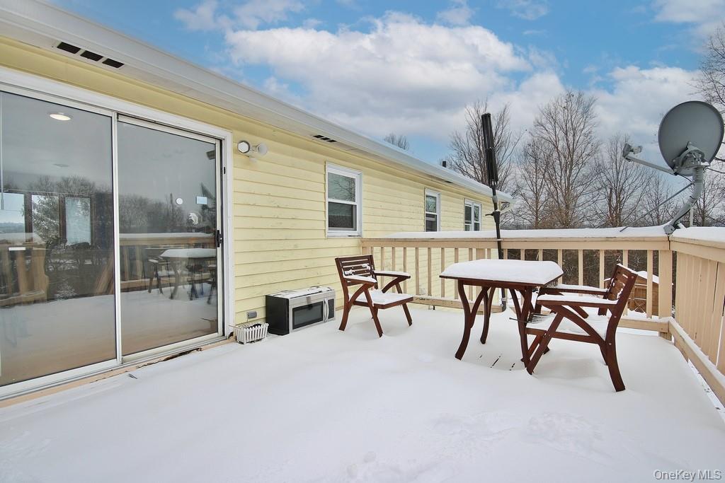 1065 Dolsontown Road Middletown, NY 10940 - Photo 12 of 50 a view of a house with backyard and sitting area