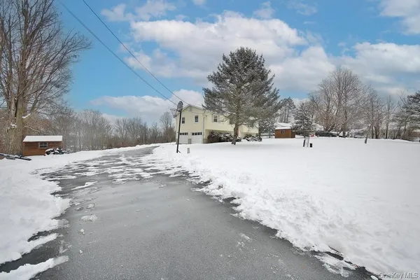 a view of a snow on the side of the road