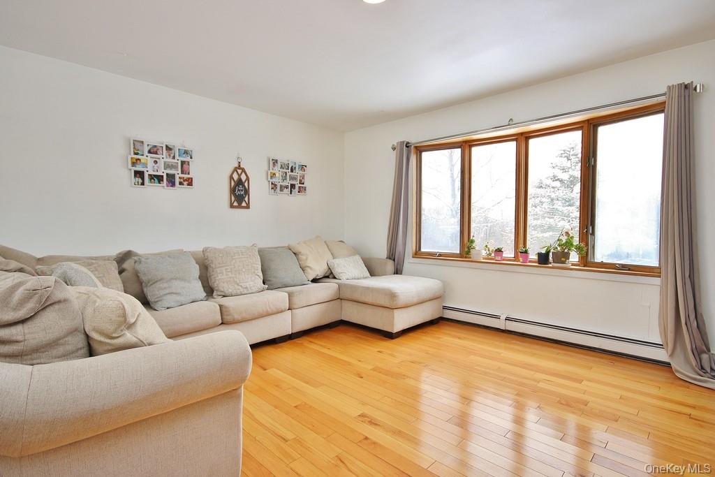 1065 Dolsontown Road Middletown, NY 10940 - Photo 21 of 50 a living room with furniture and a large window