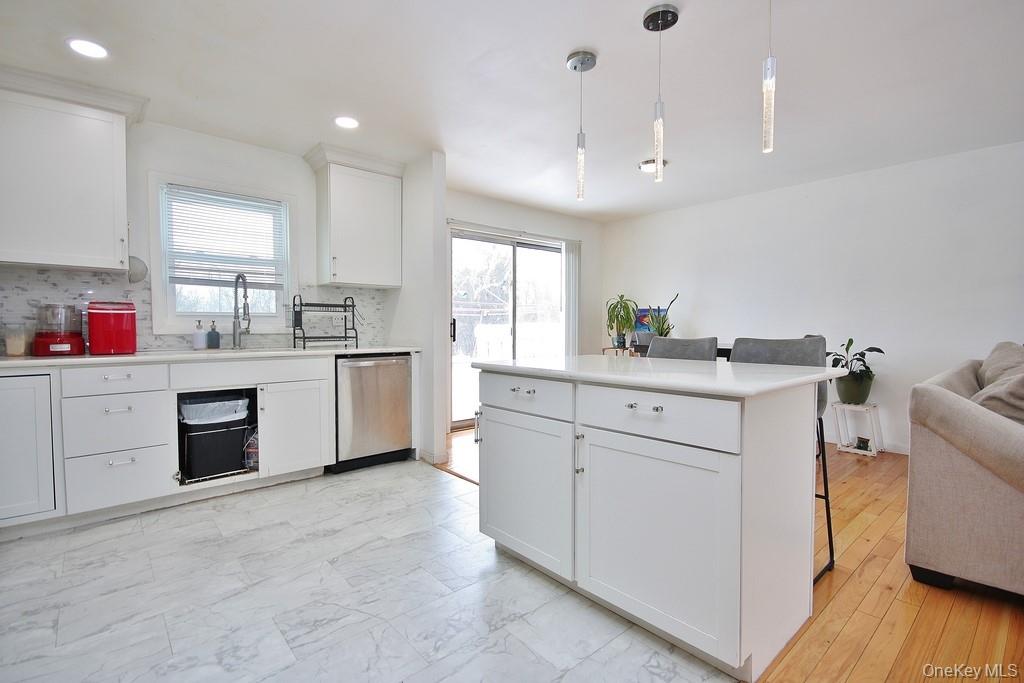 1065 Dolsontown Road Middletown, NY 10940 - Photo 48 of 50 a kitchen with a sink window and cabinets