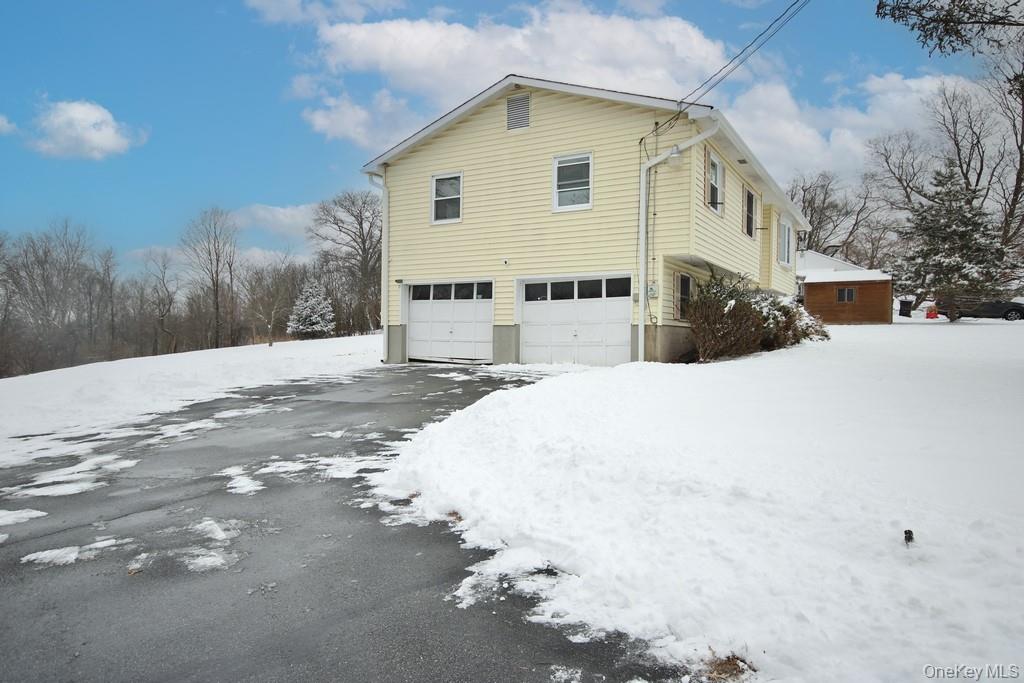 1065 Dolsontown Road Middletown, NY 10940 - Photo 3 of 50 a view of a white house with a yard