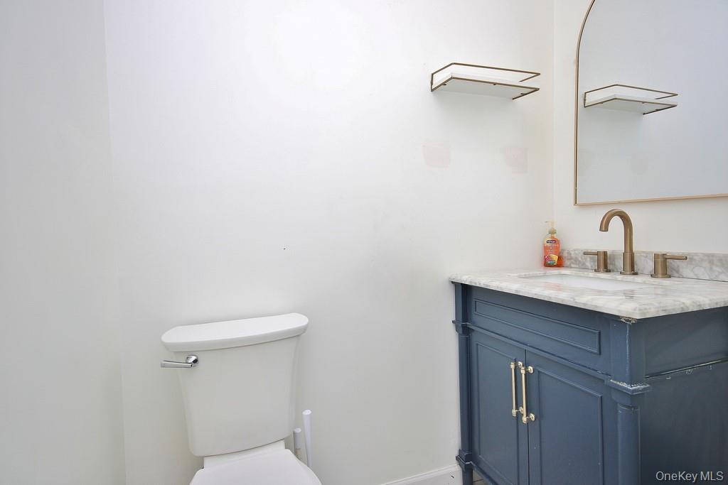 1065 Dolsontown Road Middletown, NY 10940 - Photo 30 of 50 a bathroom with a sink and a toilet