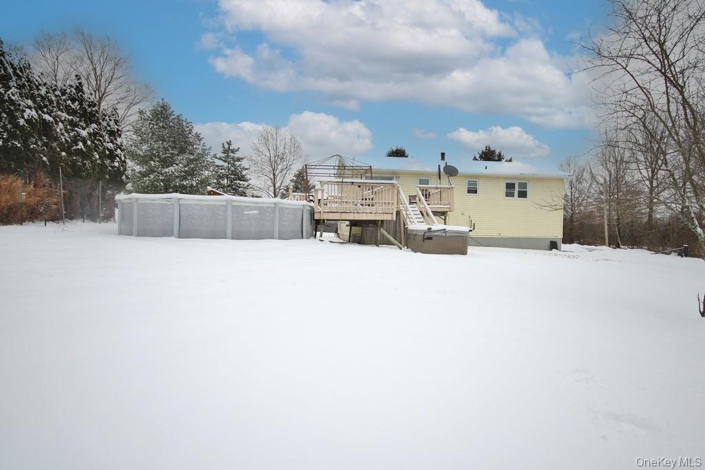 1065 Dolsontown Road Middletown, NY 10940 - Photo 4 of 50 a view of swimming pool with a yard and covered with snow