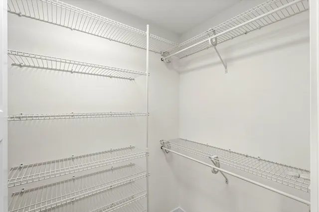 a view of a room with racks on the wall