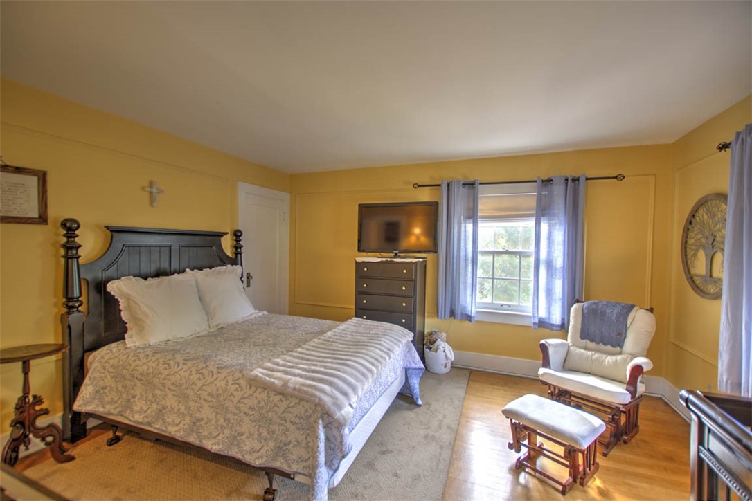 266 Cobb Avenue Decatur, IL 62522 - Photo 25 of 35 a bedroom with a bed and a couch