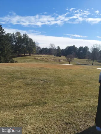 a view of an ocean and a mountain