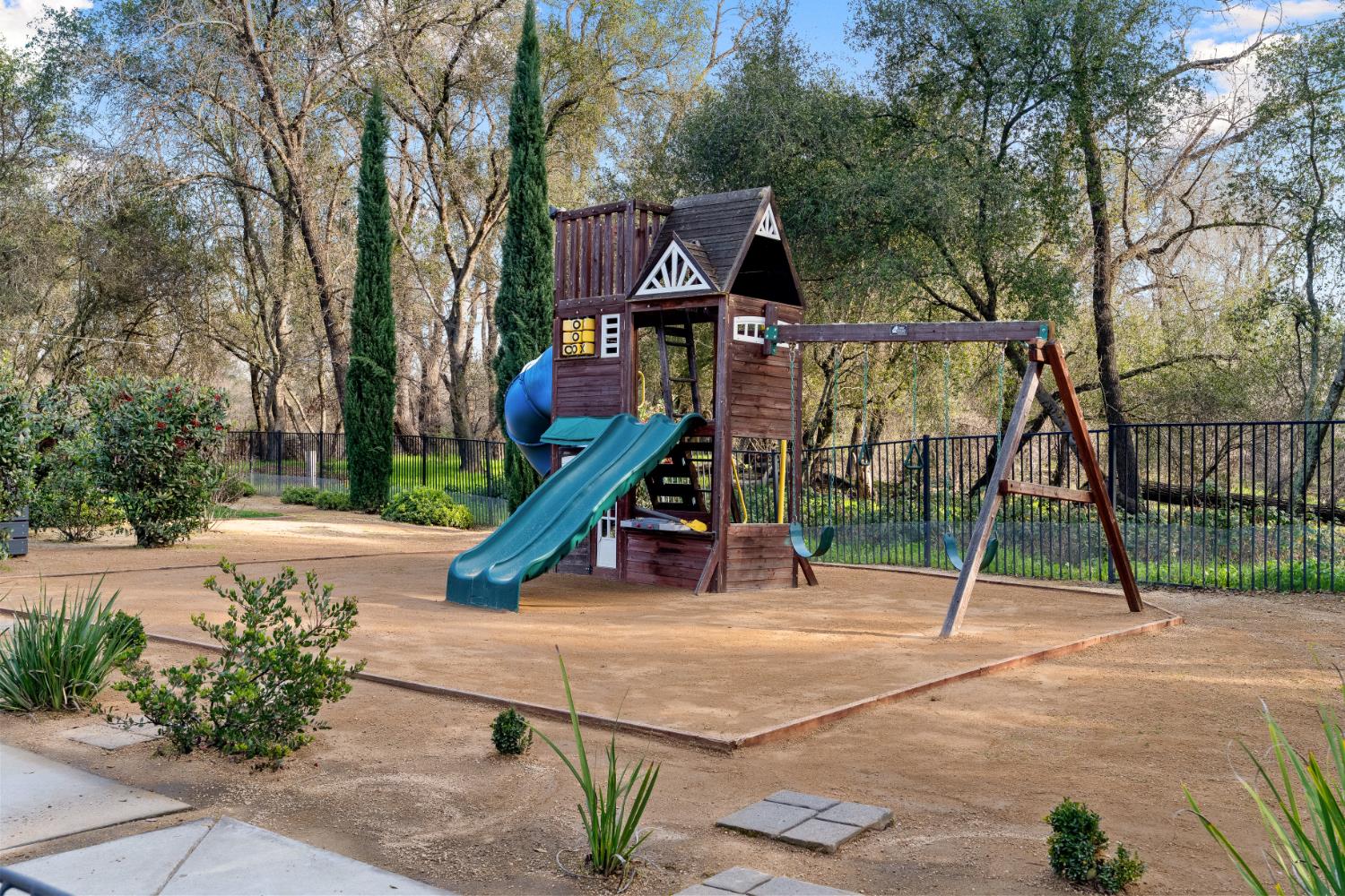 5331 Barton Road Loomis, CA 95650 - Photo 75 of 93 a view of a park with swings