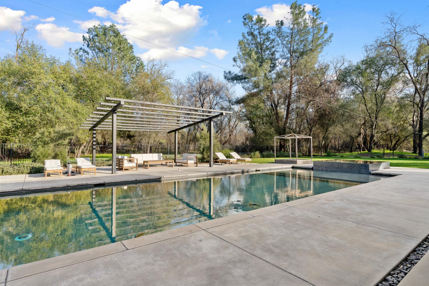 5331 Barton Road Loomis, CA 95650 - Photo 76 of 93 a view of a swimming pool with a patio