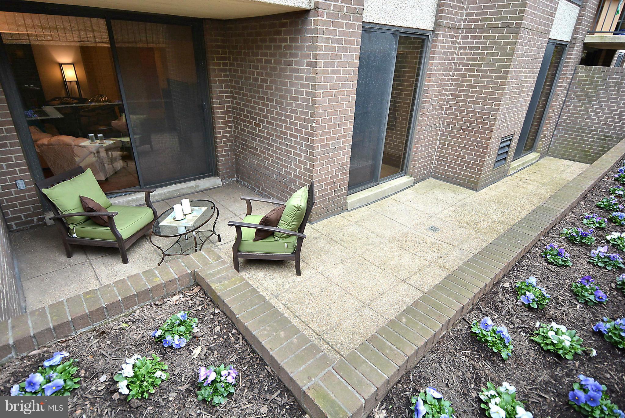 1808 Old Meadow Road, Unit 217 McLean, VA 22102 - Photo 18 of 30 a building outdoor space with patio furniture