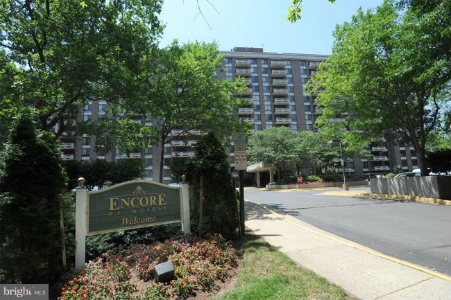 1808 Old Meadow Road, Unit 217 McLean, VA 22102 - Photo 21 of 30 a sign board with buildings in the background