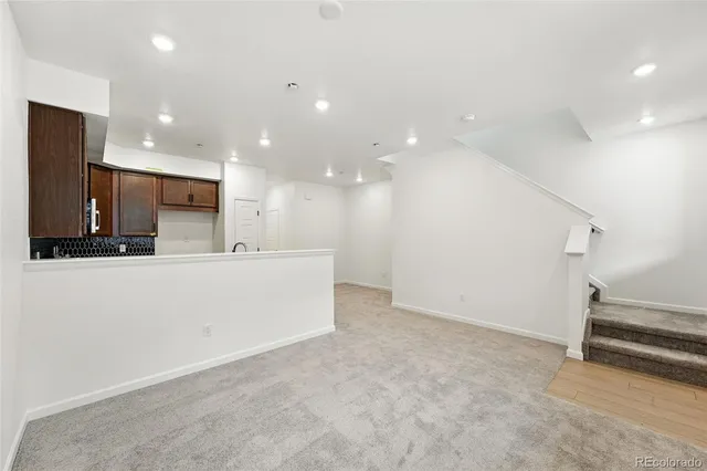 a spacious bathroom with a double vanity sink mirror double and shower