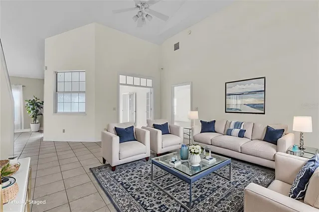 a kitchen with kitchen island a sink stainless steel appliances and cabinets