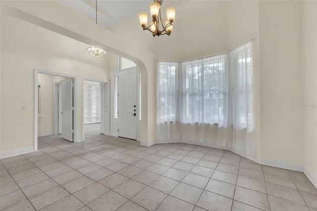 a kitchen with stainless steel appliances granite countertop a sink and a stove