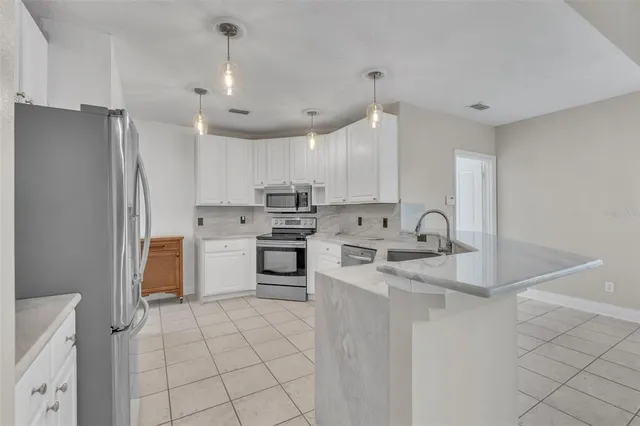 a bedroom with a bed and a shower