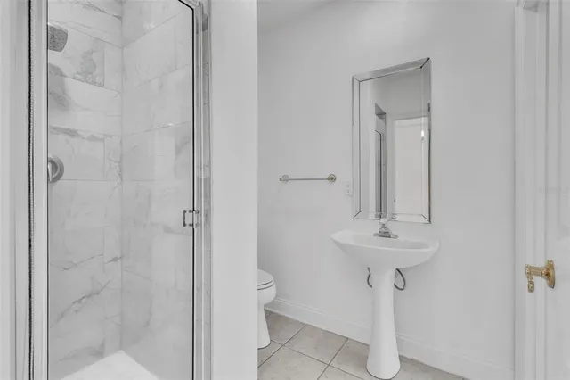 a view of a patio with a table chairs and a backyard