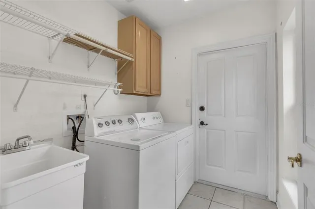 a view of yard with patio