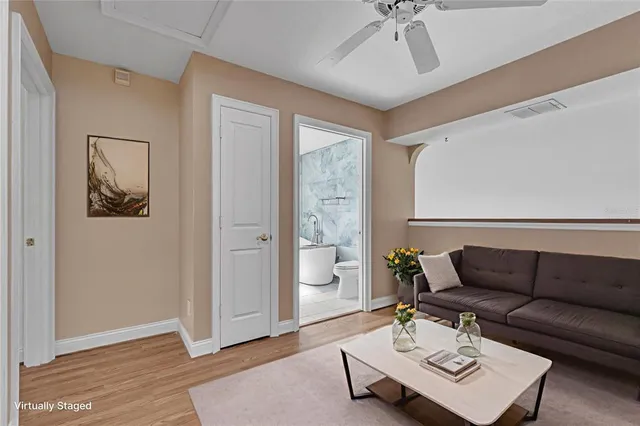 a view of a house with backyard sitting area and garden