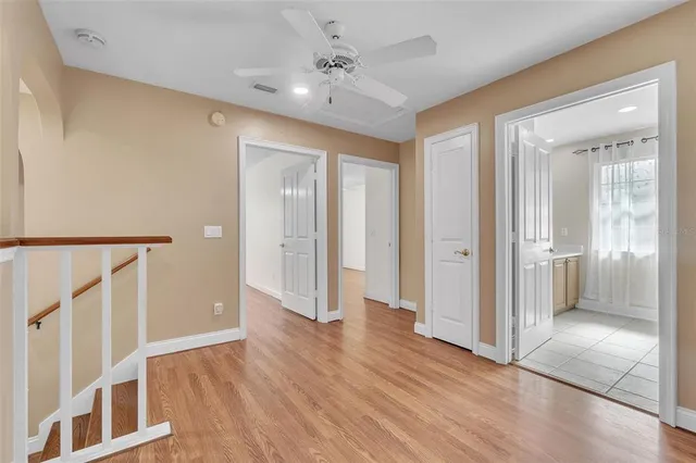 an aerial view of a house with outdoor space and garden