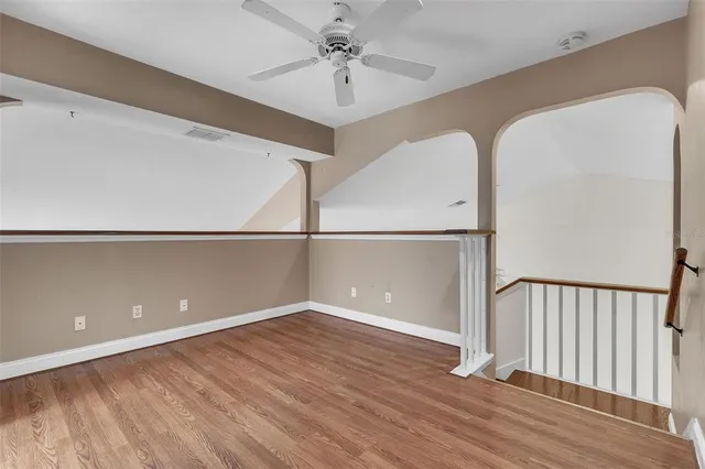 an aerial view of a house with a garden