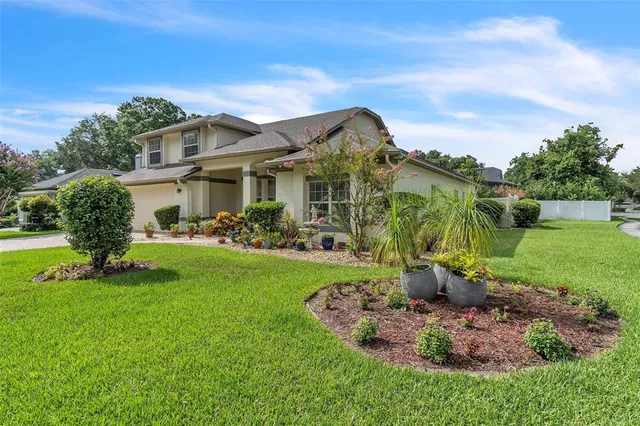 a view of a house with a big yard