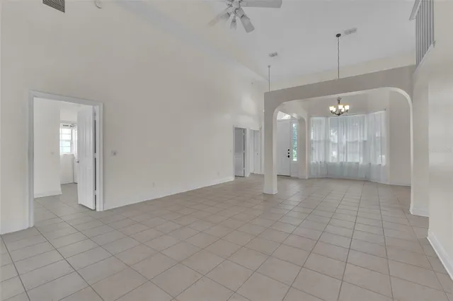 a view of an empty room and window