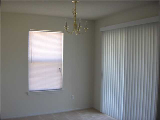 133 Sandstone Trail Crestview, FL 32539 - Photo 6 of 9 a view of an empty room with a window