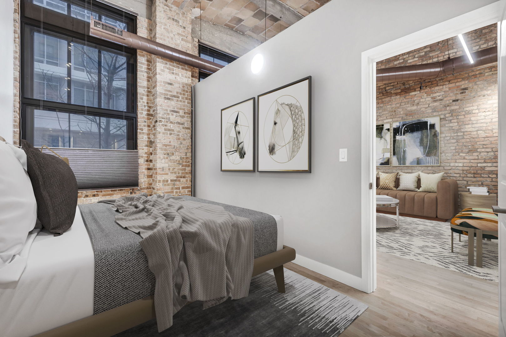 801 South Wells Street, Unit 101 Chicago, IL 60607 - Photo 17 of 33 a bedroom with a bed and wooden floor