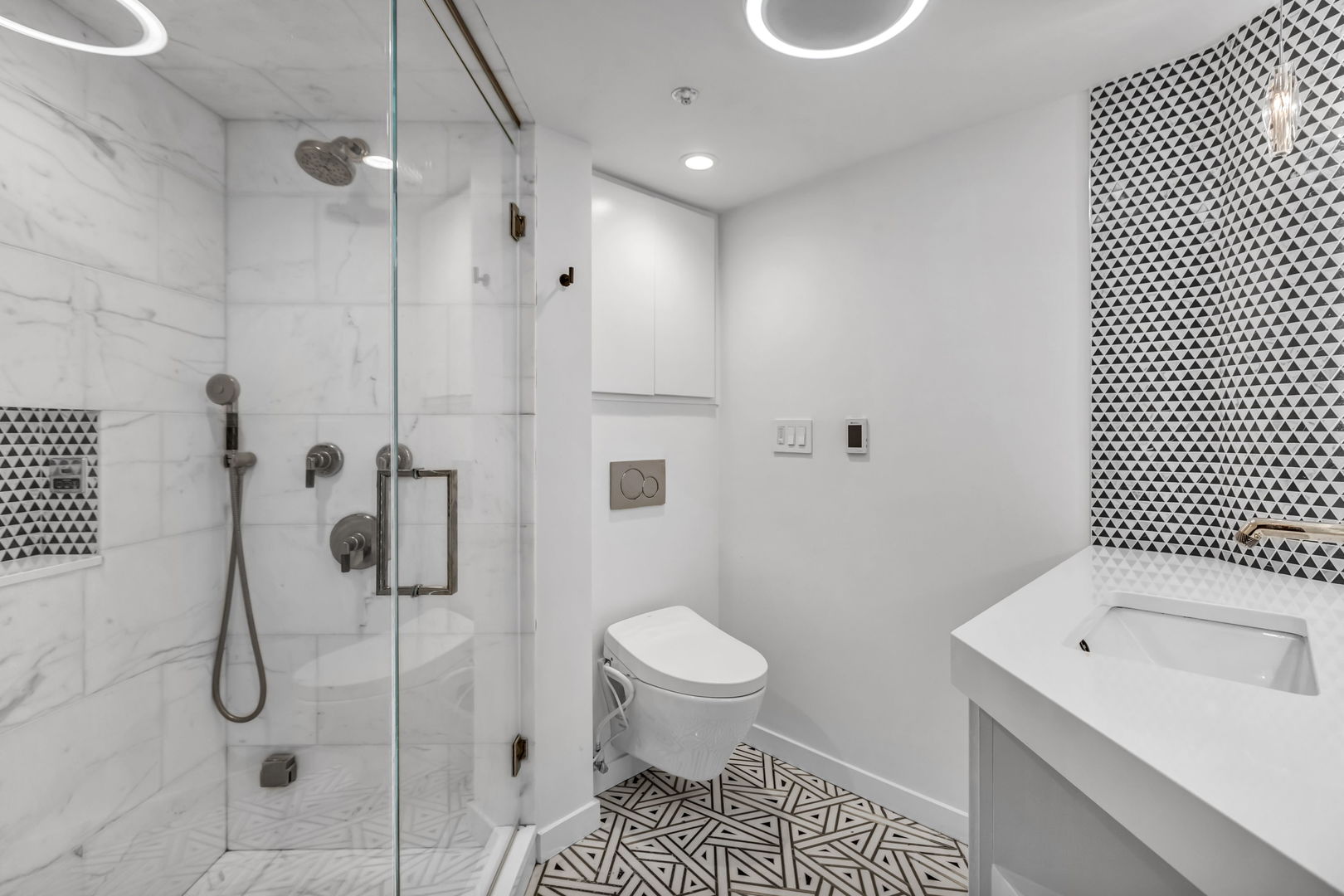 801 South Wells Street, Unit 101 Chicago, IL 60607 - Photo 19 of 33 a bathroom with a sink toilet and shower