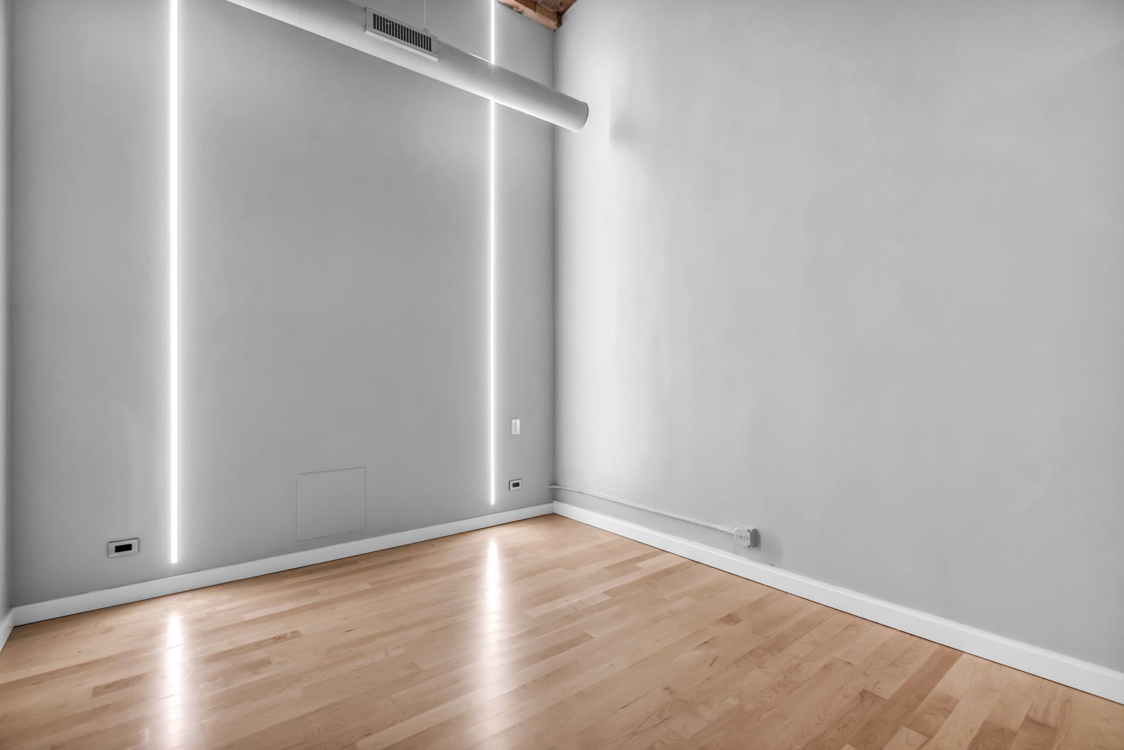 801 South Wells Street, Unit 101 Chicago, IL 60607 - Photo 22 of 33 a view of an empty room with wooden floor