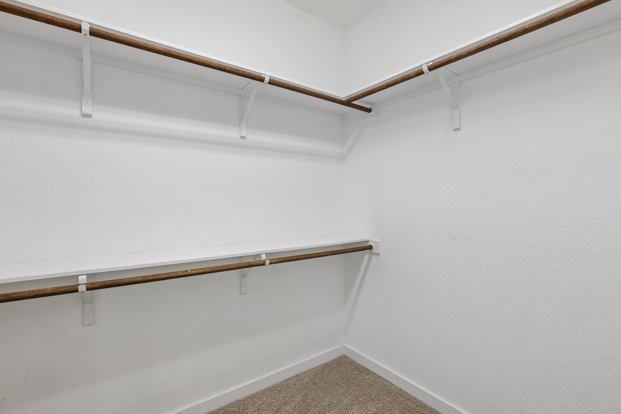 317 Independence Drive Kyle, TX 78640 - Photo 24 of 40 a view of an empty walk in closet