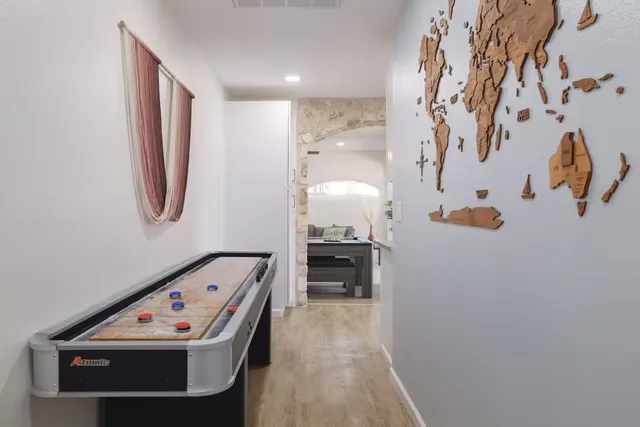 a view of living room with furniture and a window