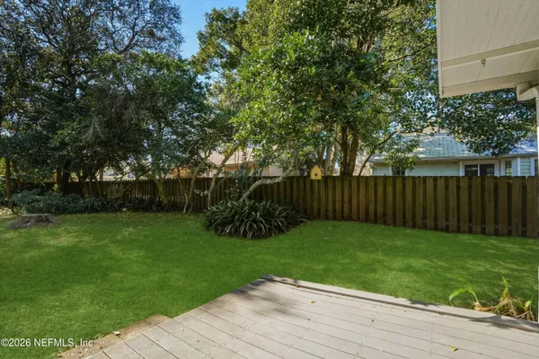 a view of a backyard with a garden