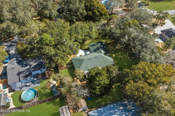 an aerial view of residential house with outdoor space