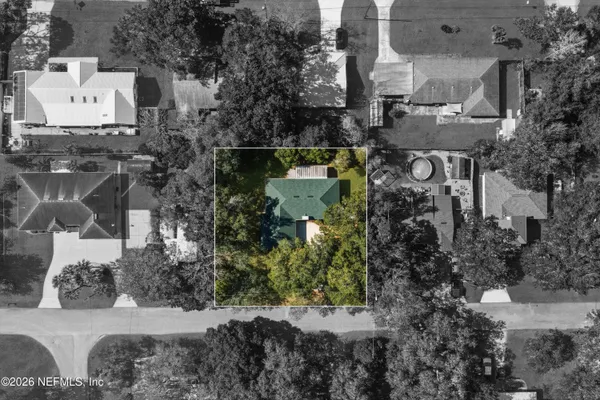 a aerial view of a house with a garden