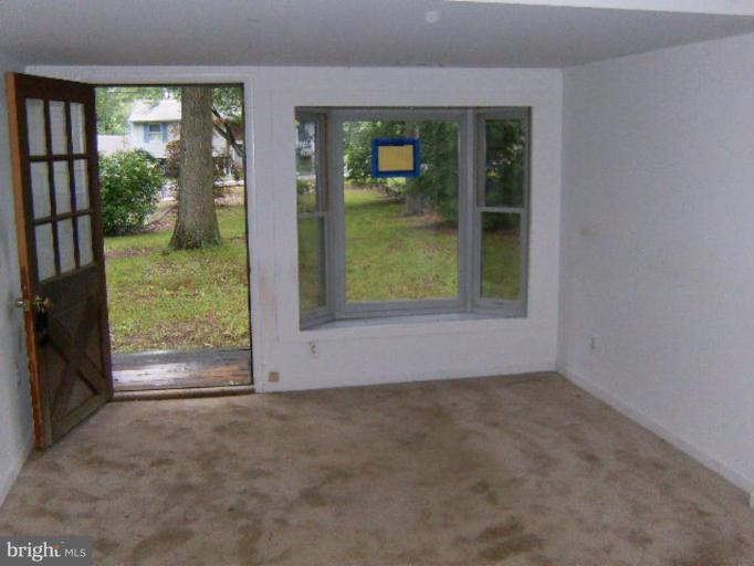 1905 Hilltop Road Pasadena, MD 21122 - Photo 4 of 13 Living Room #2