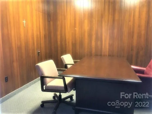 a gym room with exercise machine